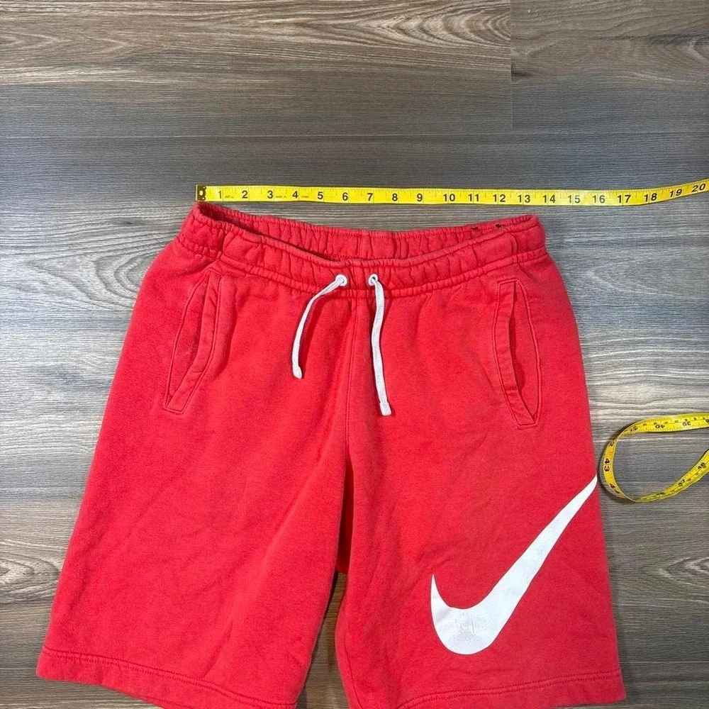 Nike red cotton & polyester shorts with white swoosh